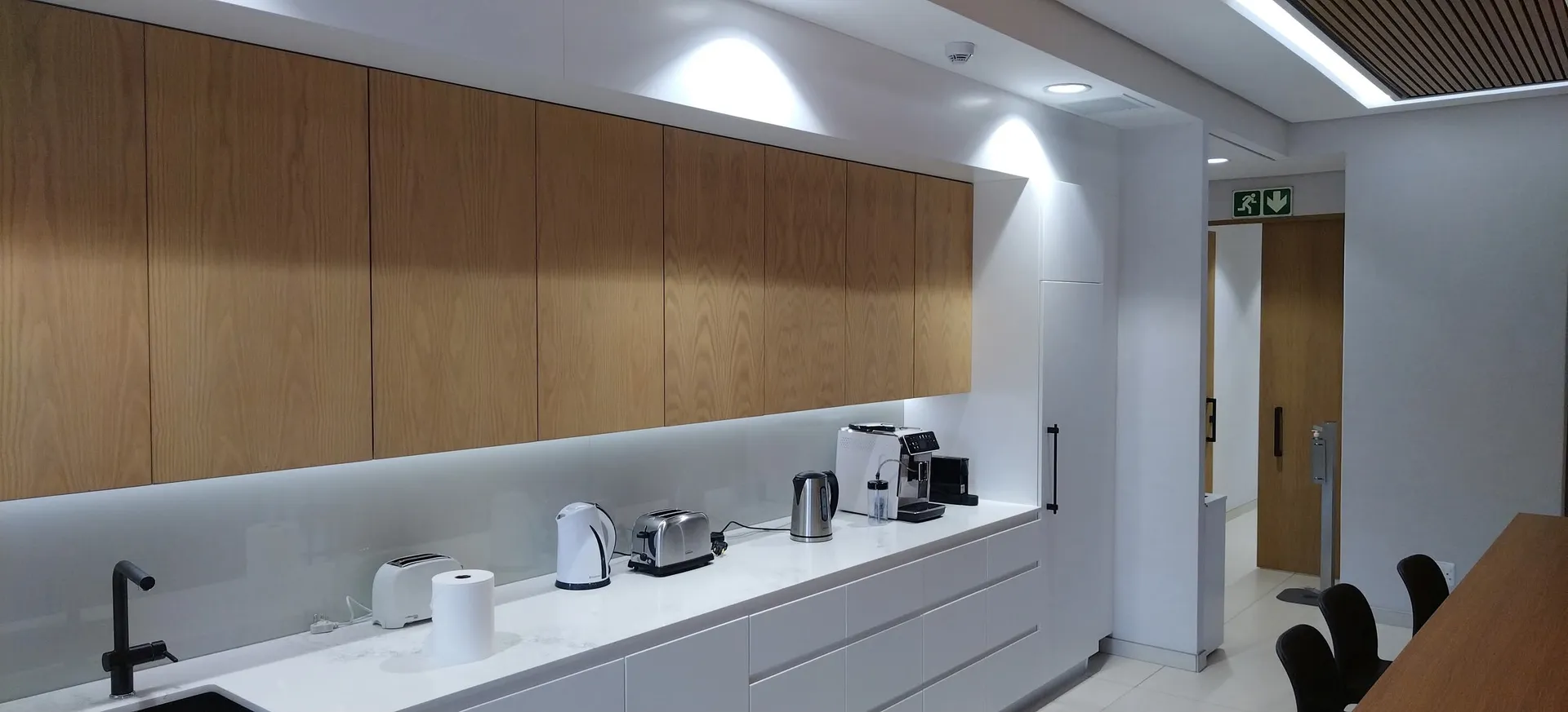 Modern kitchen with custom cabinetry by DJ Woodworx